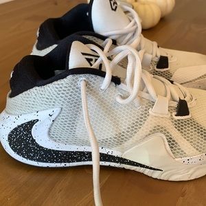 Previously loved.  Gently used Nike Basketball Sneaker .